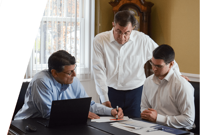 ciampi wealth management male team members photo inside at table