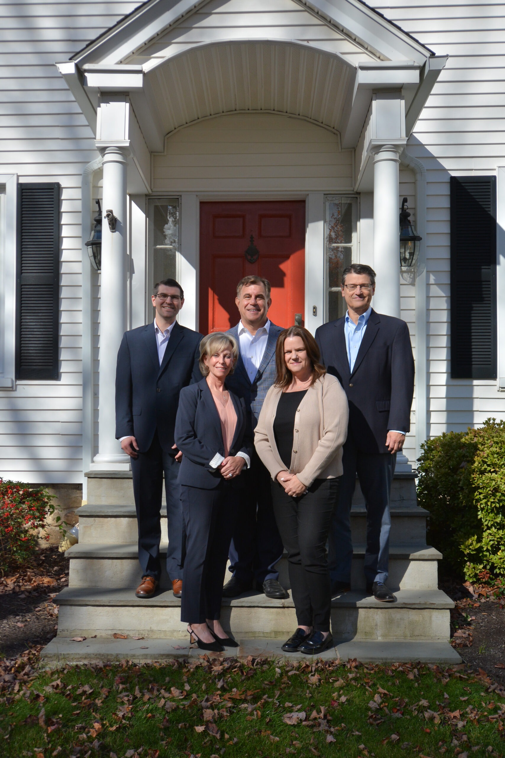 ciampi wealth management team photo outside on steps