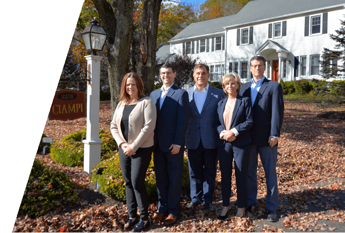 ciampi wealth management team photo outside with sign